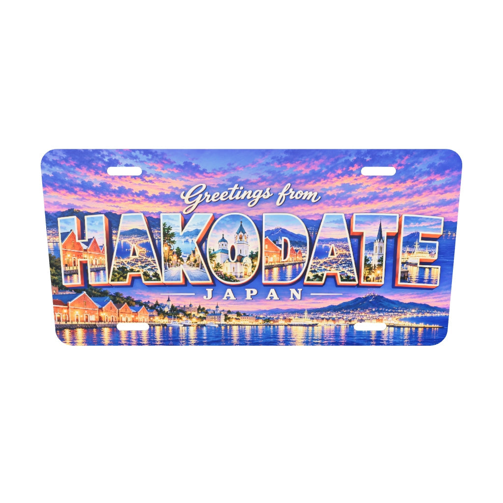 函館HAKODATEの文字内に地域の風景を描いたアルミプレートの実寸3Dモデル。横304.8×縦152.4 mm、丸角、長穴4か所。